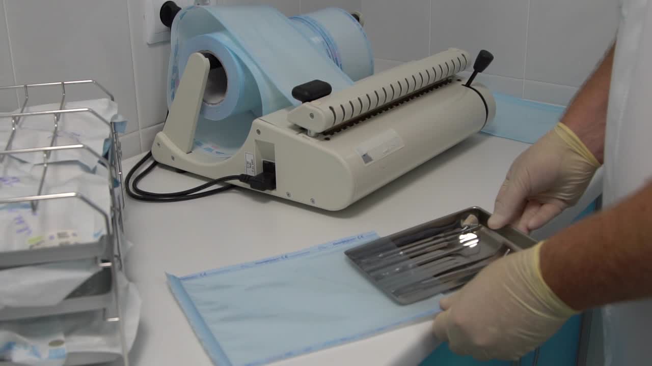 Dentist preparing instruments