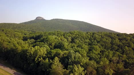 4k drone aerial of pilot mountain in the distance