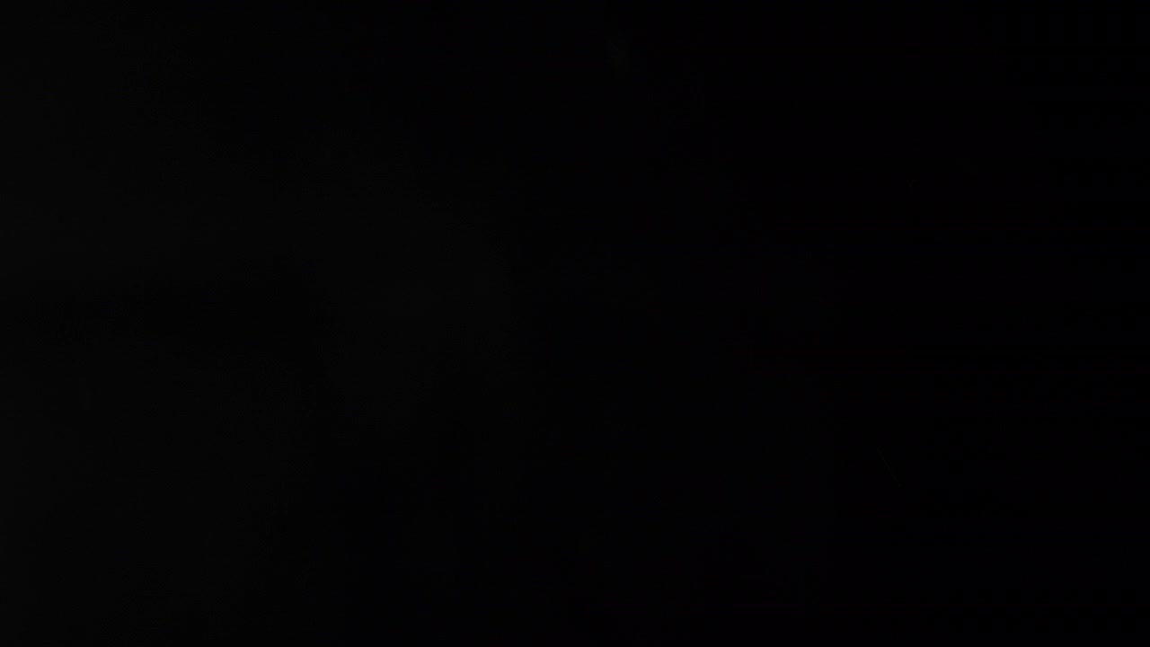 Abstract Light Streaks on Black Background