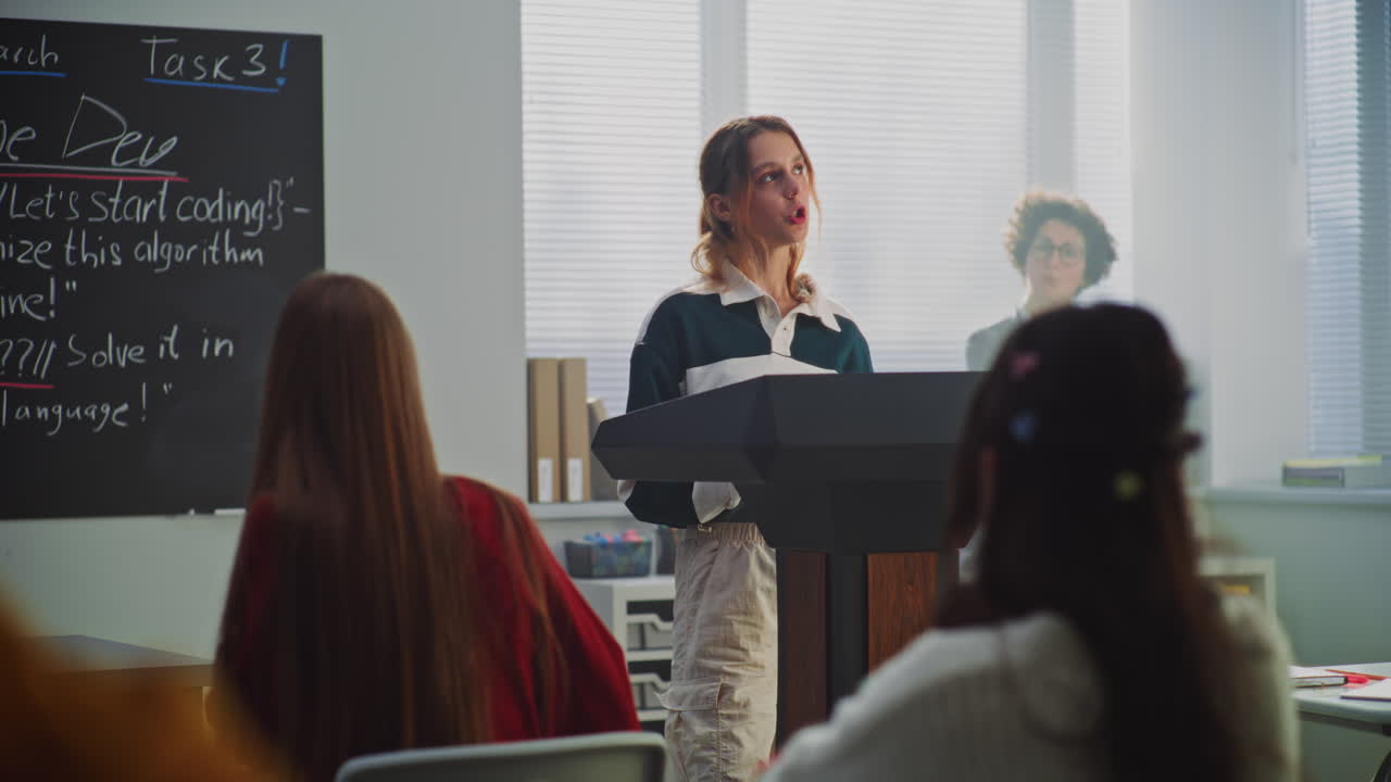 Classroom presentation with teacher and students