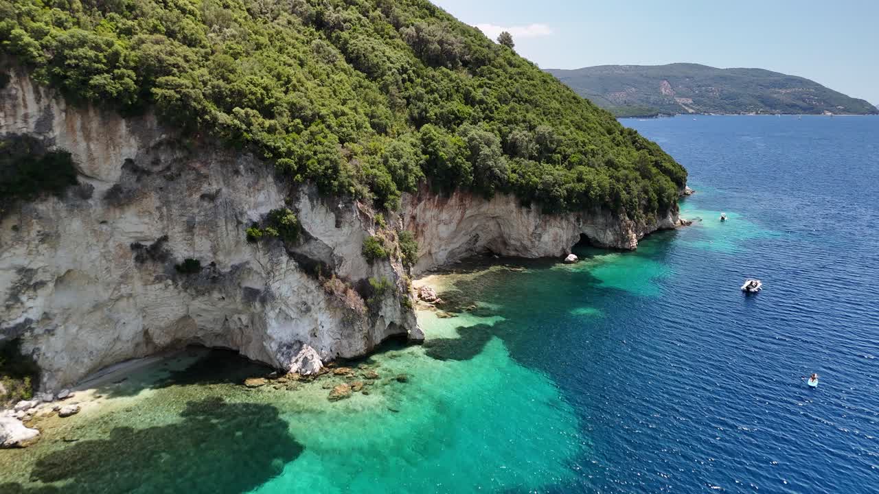 Flight toward sea cliff at Desimi Beach on Lefkada Island, Greece