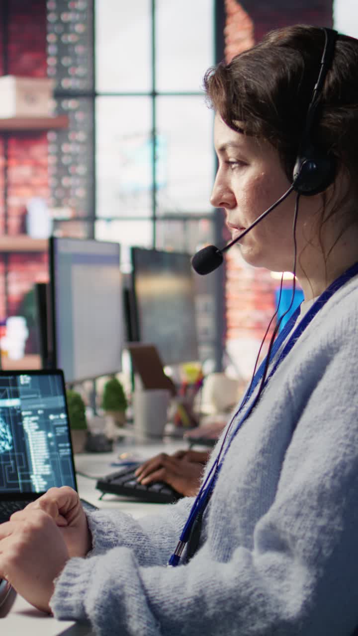 Vertical video Worker providing live chat support, typing on keyboard, using AI chatbot