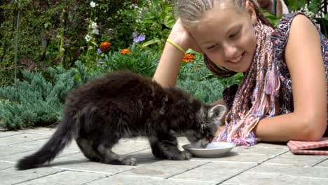 girl and kitten