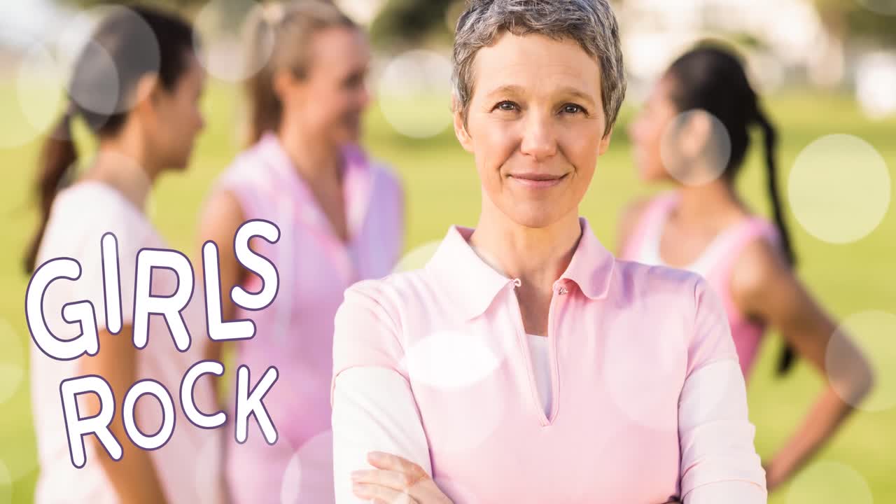 Animatie van de tekst 'Girls Rock' boven een diverse groep lachende vrouwen.