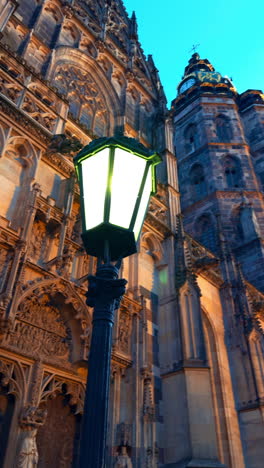 switched on lantern near the old st. elisabeth cathedral in kosice, slovakia. low angle view. vertical video.