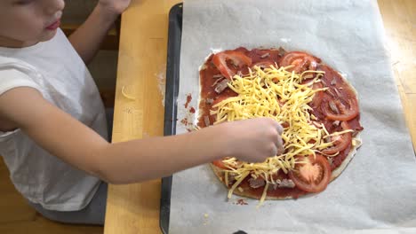 the girl cooking healthy gluten-free pizza with beef. cooking together.