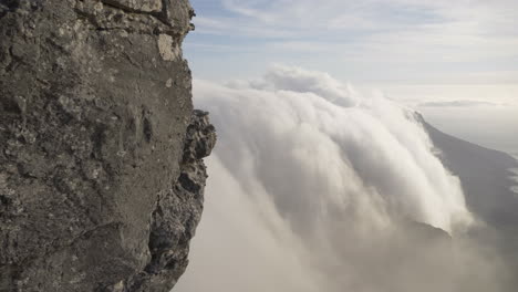 cinematic clouds rolling over mountains at sunrise in cape town south africa