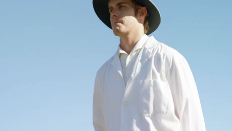 Cricket-umpire-signaling-out-sign-during-match