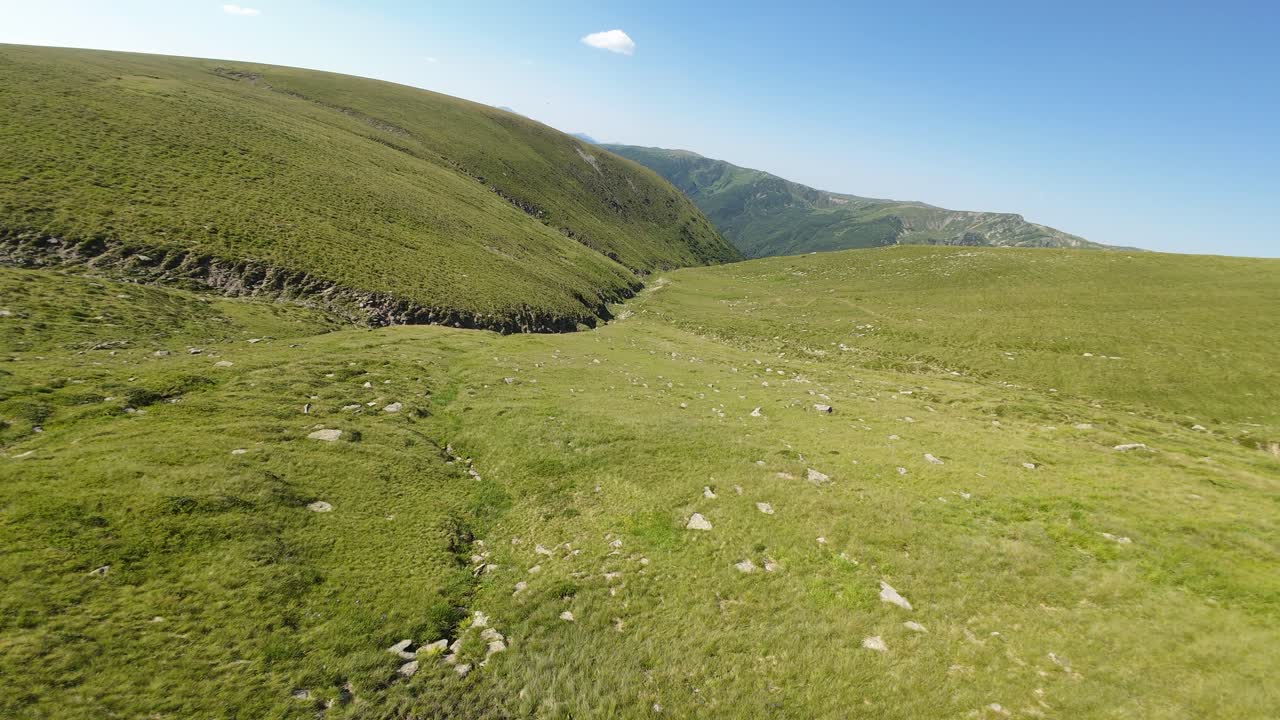 Fpv Forward shot over Fagaras Mountains in the summer, Romania