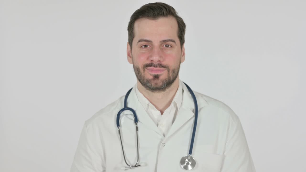 Doctor showing Thumbs Up Sign , White Background