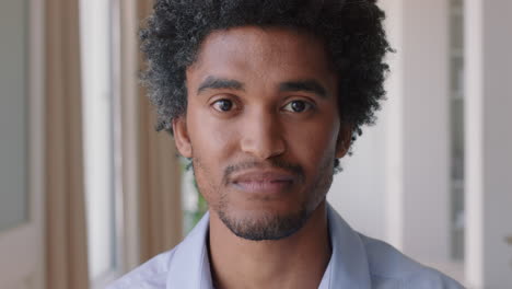 portrait attractive young man smiling confident independent male in apartment home