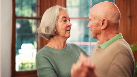 Senior-couple,-dance-and-love-of-music-in-home