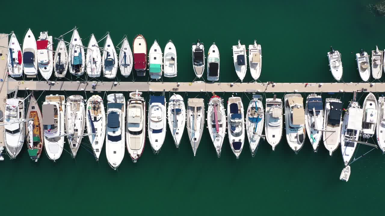 Aerial View of Boats Docked in a Marina