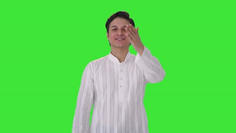 happy indian man giving flying kisses green screen