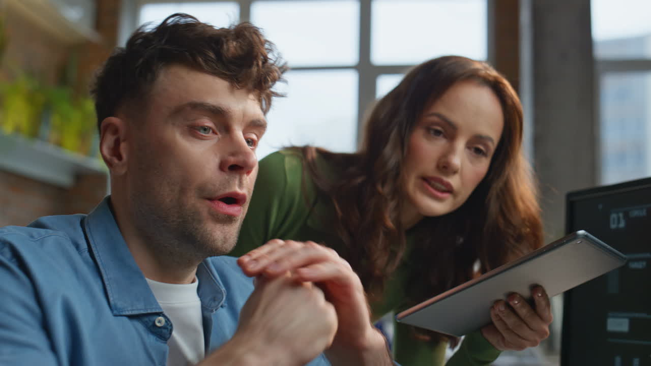 Business losers looking computer reacting fail at office closeup. Shocked team