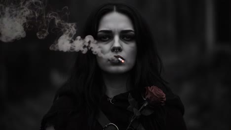 a mysterious figure amidst smoky haze: an emotive portrait of a woman with a rose and cigarette in a dark, enigmatic setting
