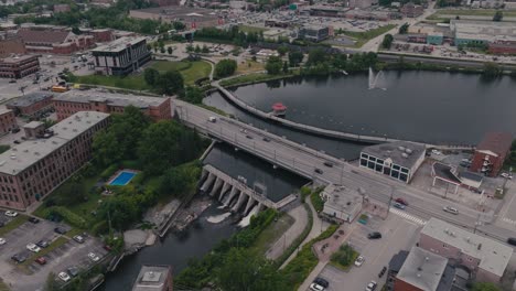 a view of a small dam along magog river in sherbrooke downtown, quebec canada