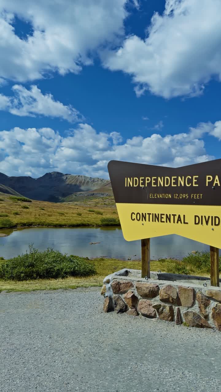 Vertical panning shot of Independence Pass at the Continental Divide in Colorado, showing dramatic Rocky Mountain scenery, alpine peaks, and rugged high-altitude terrain