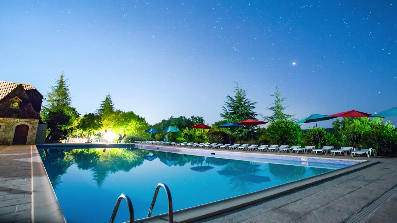 Milky way time lapse swimming pool stars reflection France