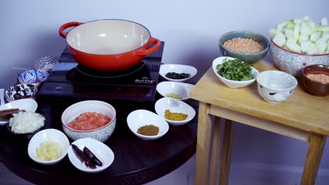 Wide-shot-of-ingredients-to-make-a-papaya-curry-Green-and-ripe-yellow-organic-fresh-papaya-pawpaw