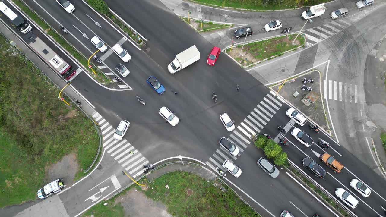 Complex intersection Aerial pullout shot: Public transportation Rome