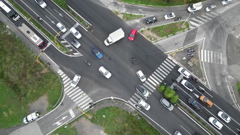 complex intersection aerial pullout shot: public transportation rome