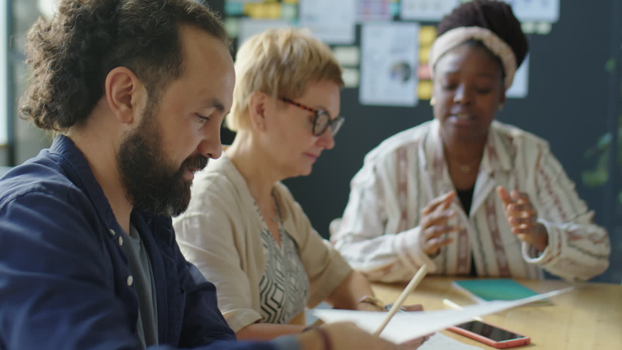 Mutiethnic Business Team Discussing Project