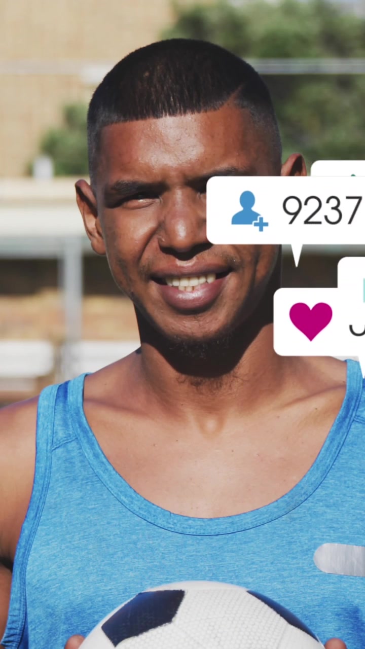 Animation of social media icons over male soccer player with soccer ball on sports field