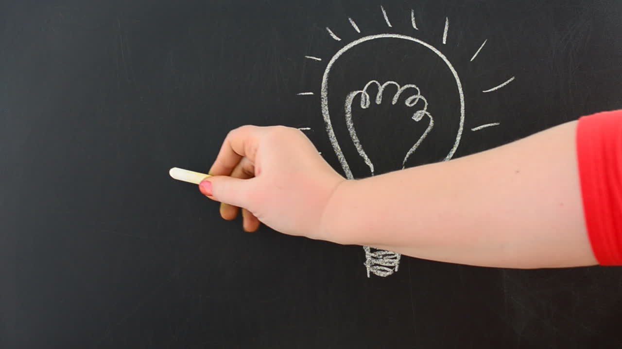Glow lamp and candle. We draw chalk on a board