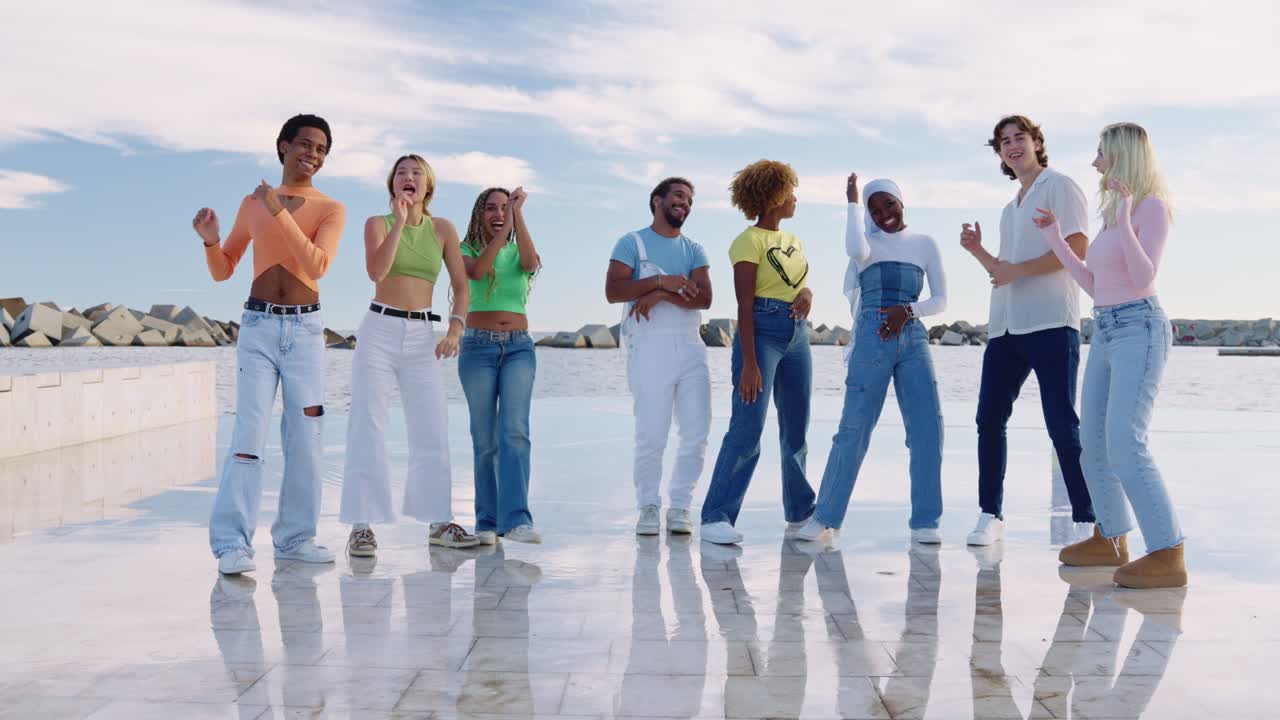 Group of young people dancing outdoors