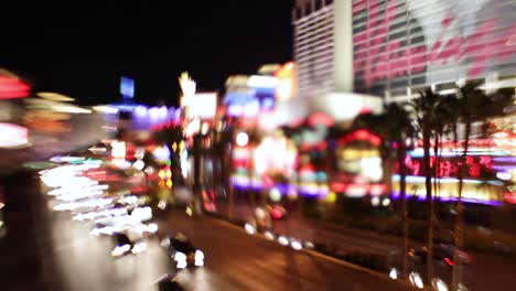 selective focus image of the electricity and energy of bright lights and traffic on the strip at night in las vegas nevada 1