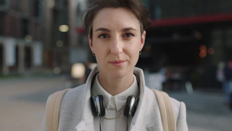 stylish young business woman portrait confident female  executive looking serious pensive at camera in city