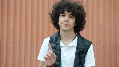 teenager pointing rejecting gesture