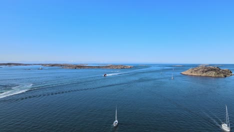 sailboats sailing at calm waters of skagerrak strait near lysekil in sweden