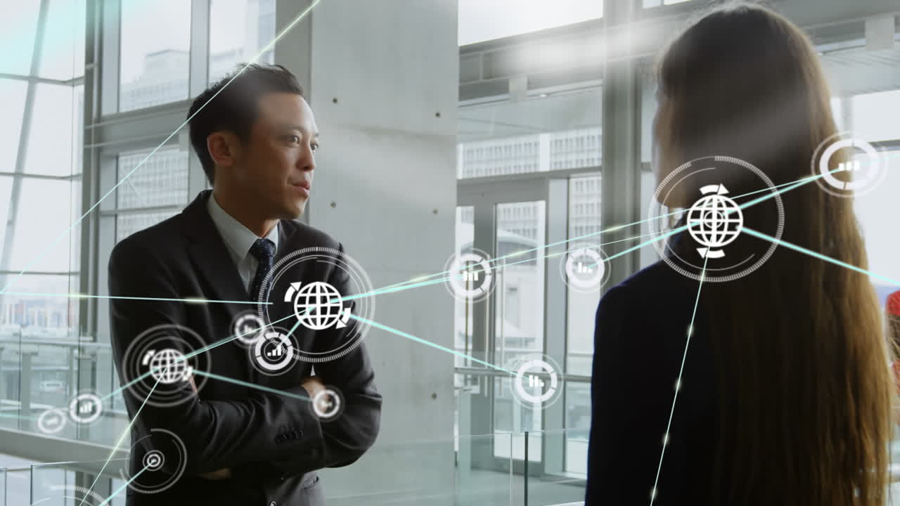 Animation of network of connections with icons over diverse business people working at office