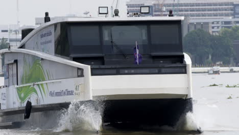 eco-friendly electric speedboat cruising through the chao phraya river in bangkok, facilitating water transportation for residents and visitors, highlighting sustainable transport options.