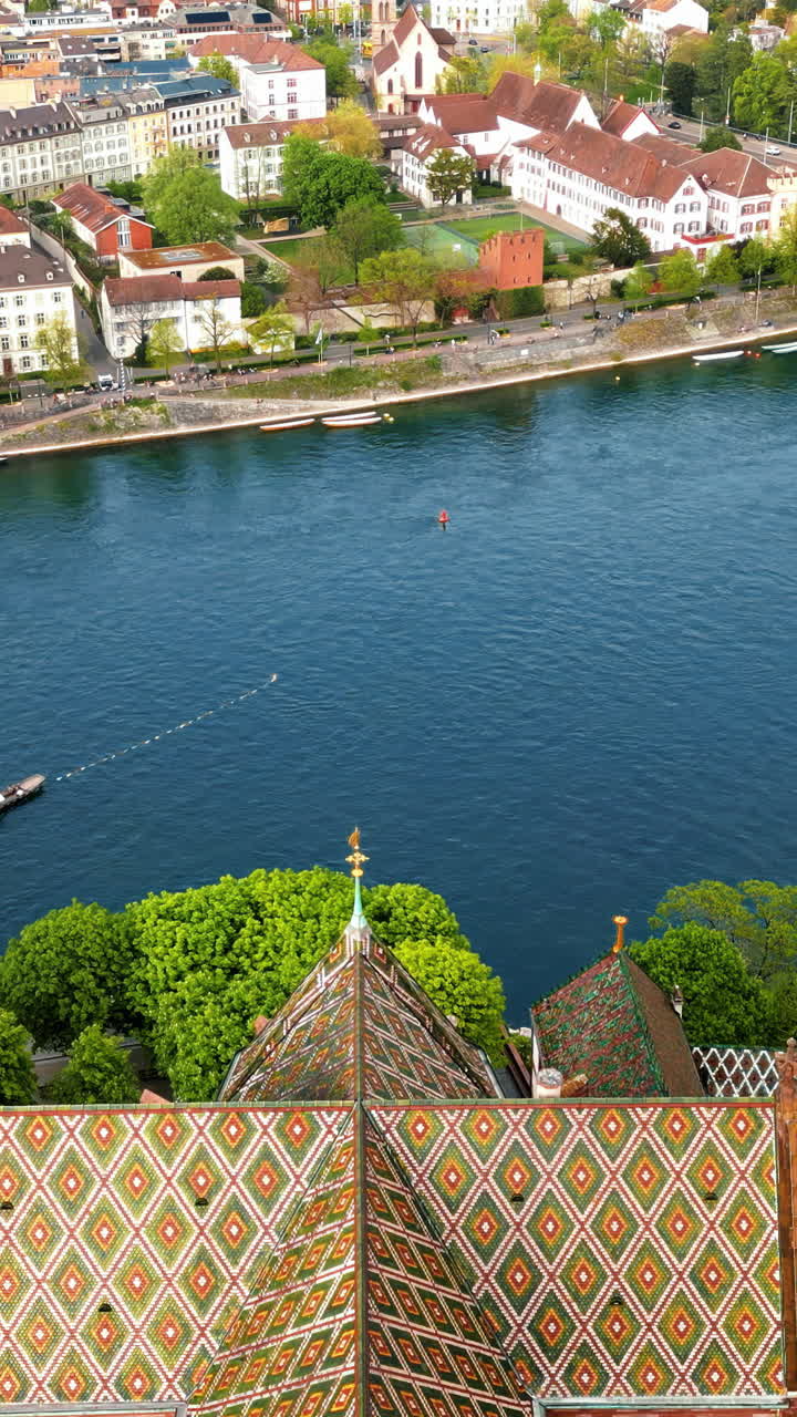 Aerial, drone view of the Basler Munster Cathedral in Basel, Switzerland. Vertical