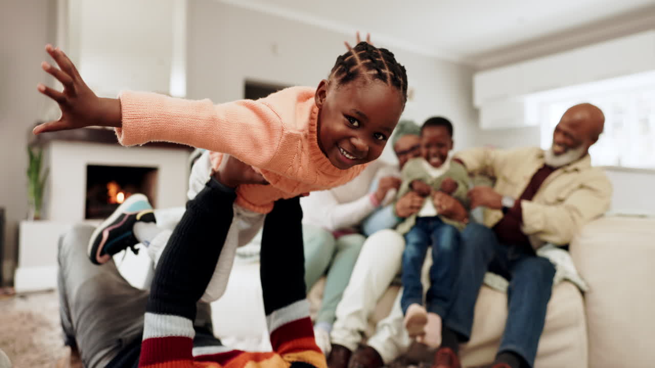 Happy, plane and playful with black family