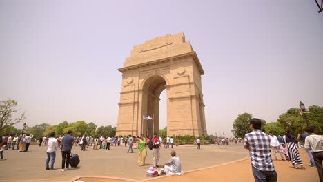 crowds of tourists at india gate new delhi