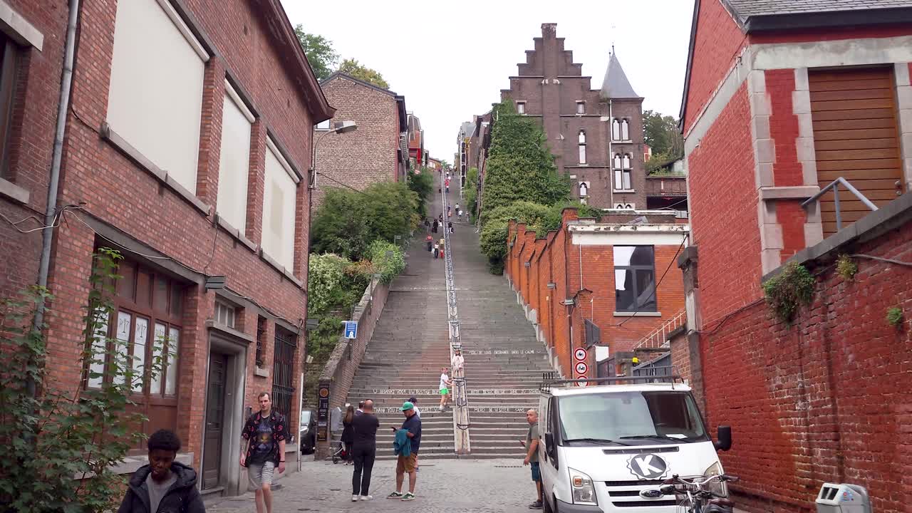 People downstairs the staircase Montagne de Bueren in Liège, Belgium. The famous stairway has 374 steps and was built in 1881