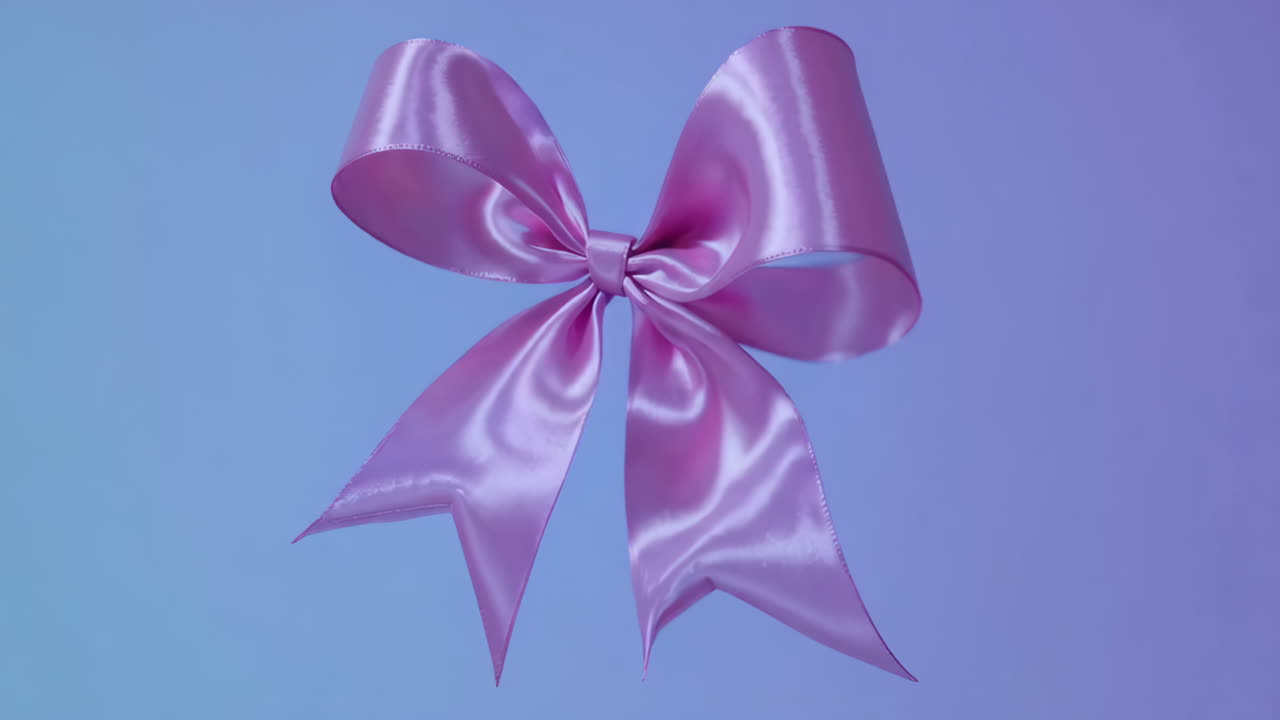 Shiny Pink Satin Bow on a Gradient Background