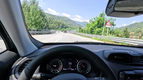 driving through scenic piedmont, italy in summer