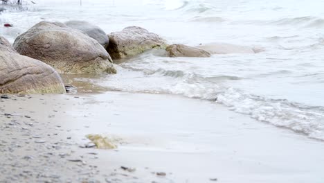 Small-waves-breaking-over-rocks-on-Lake-Heron