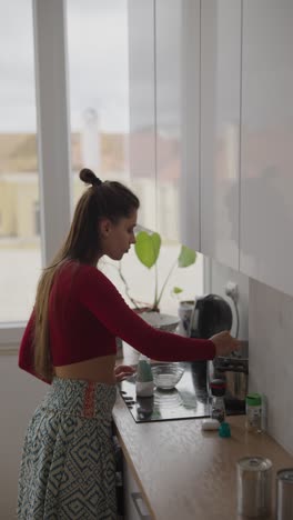 woman cooking in a modern kitchen