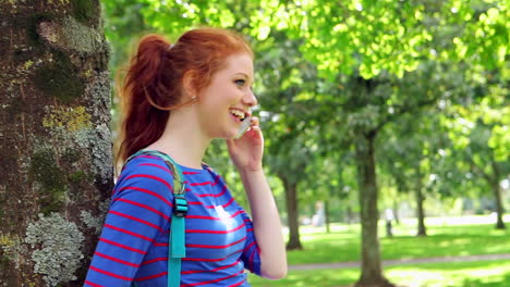 student walking and making a call