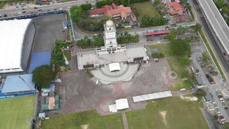 High-Above-Jam-Besar-Dataran-in-Johor-Bahru-with-Soccer-Fields-and-an-Expressway-Nearby-in-Malaysia