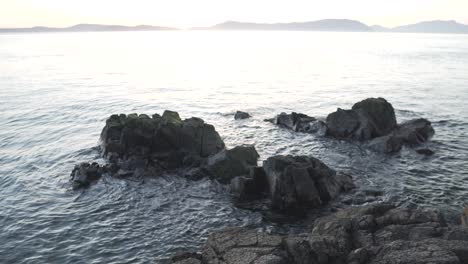 rocky coast and seascape at sunrise