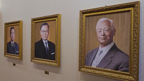 replicas of the portraits of former presidents at the presidential experience center on the third floor of the presidential archives at cheong wa dae - slow pan reveal