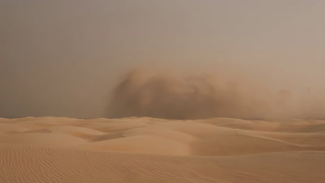 desert landscape with approaching sandstorm over sand dunes