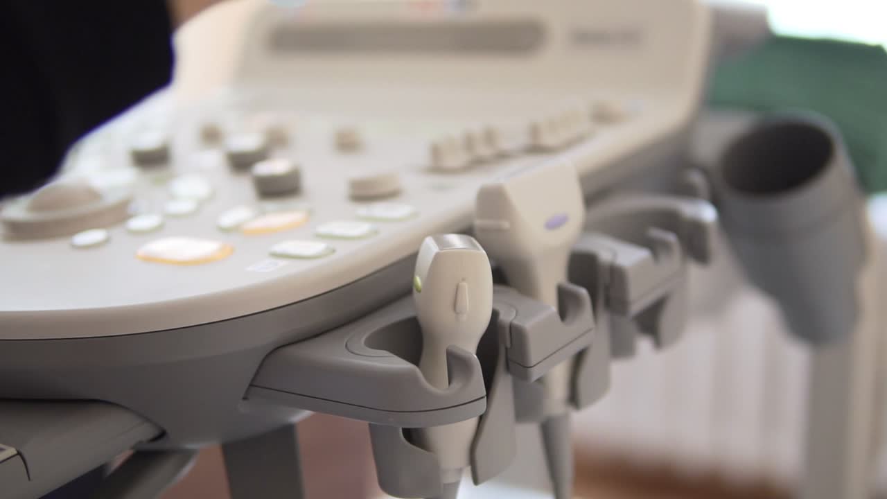 Close up of apply gel on ultrasound probe